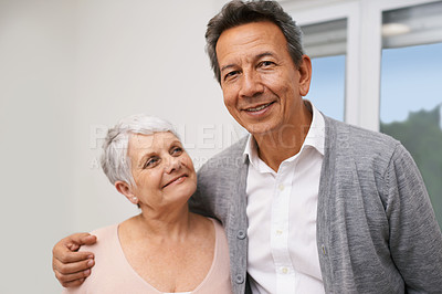 Buy stock photo Portrait, senior or happy couple hug in lounge at home for bonding together with support, pride or smile. Retirement, people or romantic man by an elderly woman for peace, love or care in marriage