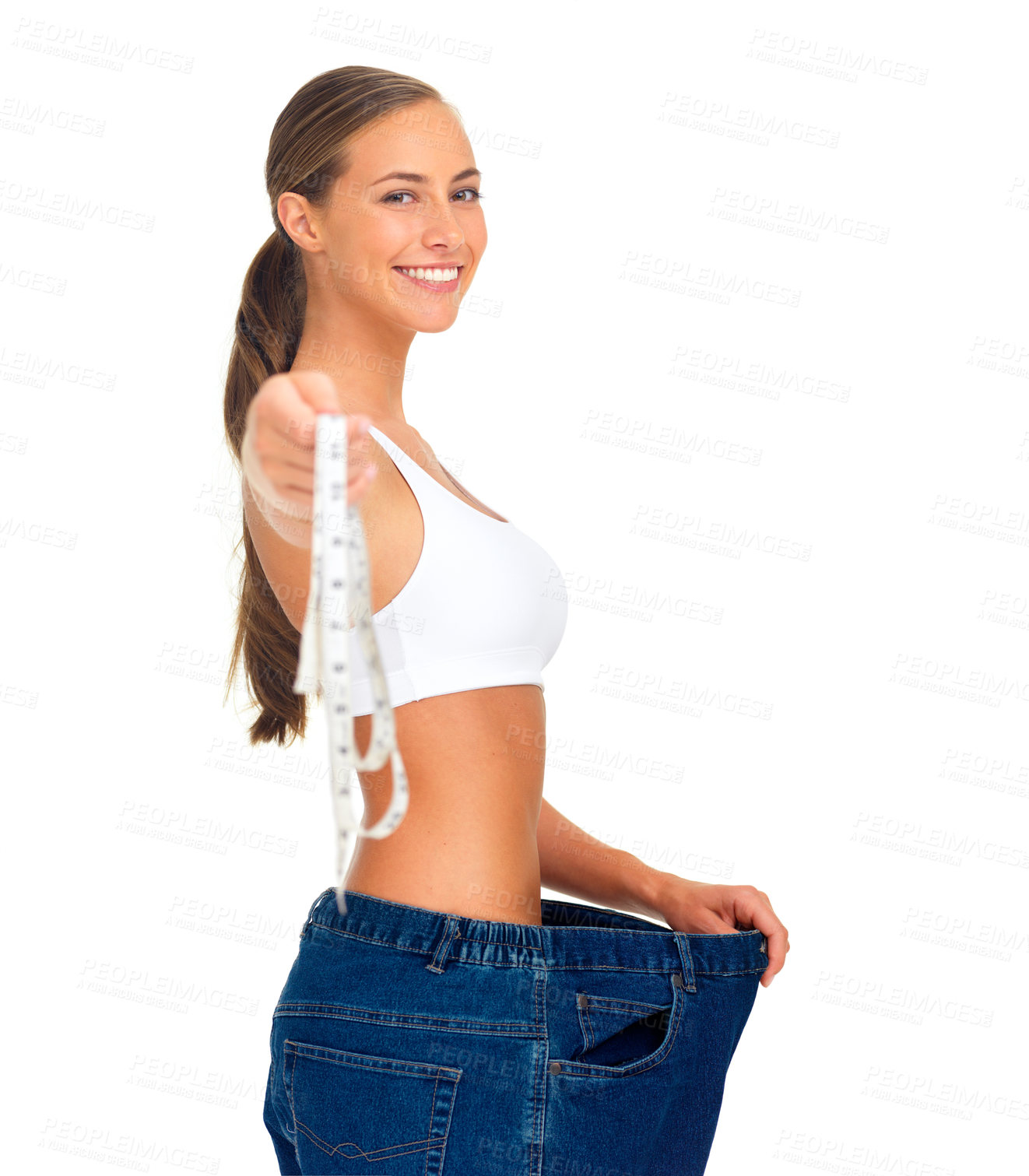 Buy stock photo Diet, weightloss and happy woman with measuring tape, jeans and smile isolated on white background. Fitness, healthcare and wellness, woman with slim figure and liposuction skinny waist measurement.