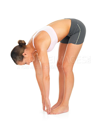 Buy stock photo Fitness, exercise and woman stretching in a studio for wellness, healthy training and wellbeing. Sports, health and slim female model doing a warm up workout while isolated by a white background.