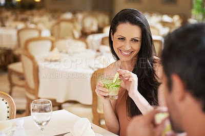 Buy stock photo Restaurant, love and date with couple, discussion and bonding together with luxury and drinking. Romantic, man and woman with cocktail and Valentines day with lunch and weekend break with celebration