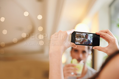 Buy stock photo Restaurant, picture and couple with cellphone, screen and connection with mobile user and photograph. Date, man and woman with smartphone and digital app for memory and romantic with Valentines day