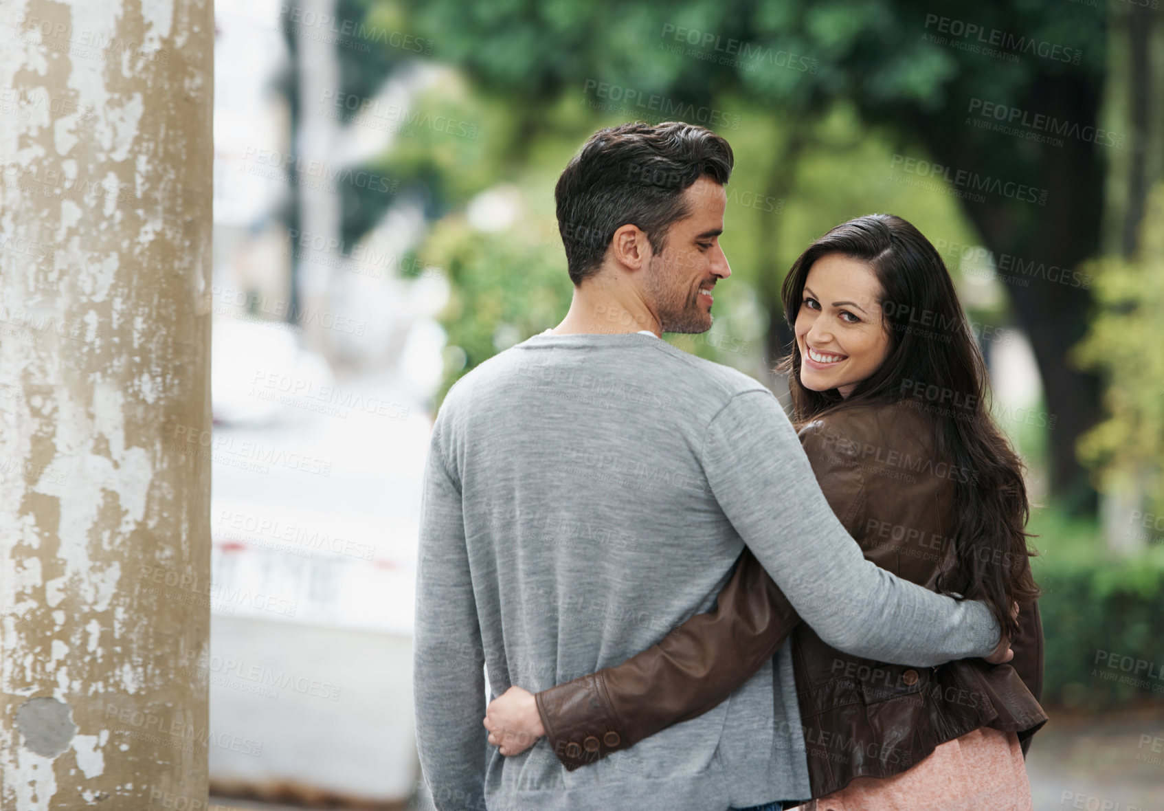 Buy stock photo Happy couple, portrait and walking in park with love, embrace and bonding together on vacation in city. Husband, wife and smile on face on romantic date, holiday and adventure in italy for honeymoon