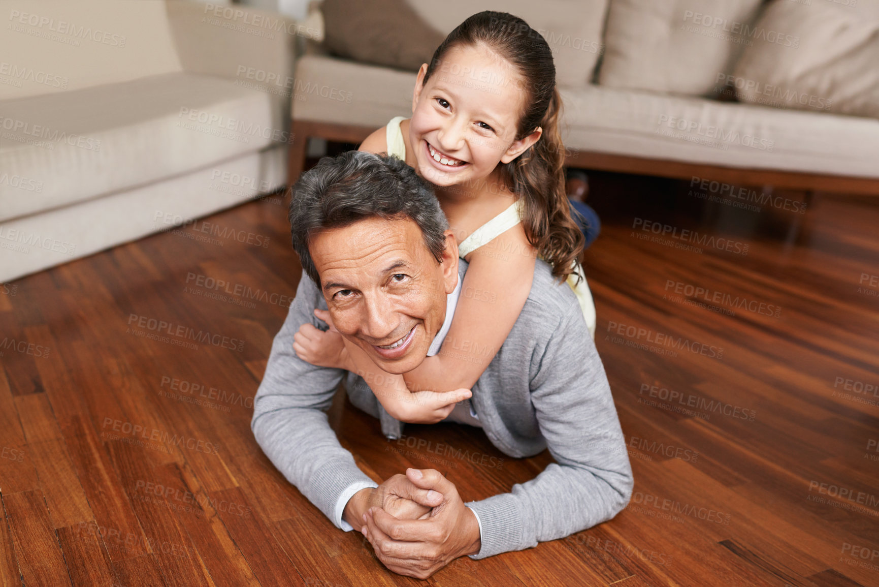 Buy stock photo Portrait, piggyback or happy grandpa with a child on the floor playing or hugging with love in family home. Elderly grandfather, kid or old man relaxing or bonding to enjoy quality time in retirement