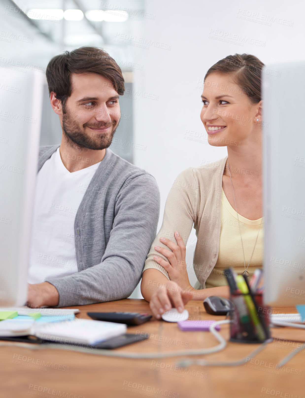 Buy stock photo Coworking, smile and business people with computer consultant employees with website. Happy, flirting and tech in an office with digital collaboration and teamwork together at a startup company