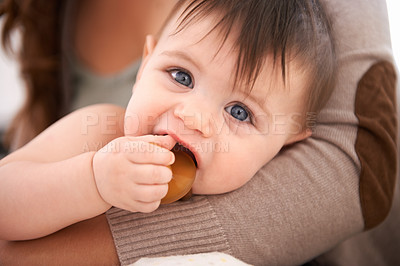 Buy stock photo Portrait of a young baby boy being held by his mother