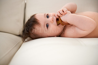 Buy stock photo Baby, cute and happy with dummy on sofa for sleep, healthy development and growth. Infant, adorable and innocent with smile, calm and pacifier on couch to relax in family home with support and love 