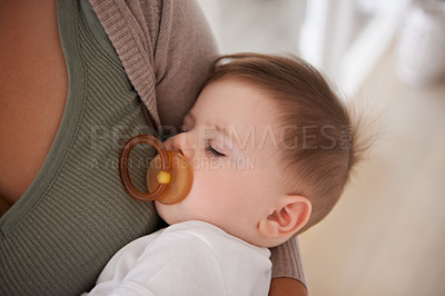 Buy stock photo Baby, sleeping and pacifier with relax on mother for healthy development, growth and tired in bedroom. Child, rest and dummy in mouth with nap, dreaming and wellness in nursery for comfort and trust