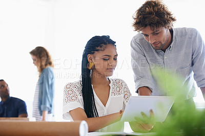 Buy stock photo Creative people, tablet and coaching in planning, design or research on project at office. Man helping woman on technology for staff training, architecture or brainstorming ideas in startup workplace