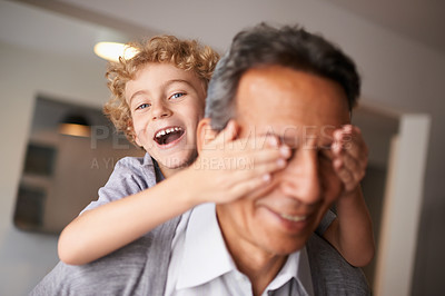 Buy stock photo Portrait, grandfather and boy with piggyback and smile for multiracial, family and bonding together. Happy, mature man and male grandchild with hug for laugh, cheerful and fun babysitting at home