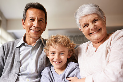 Buy stock photo Portrait, grandparents and boy with happiness, love and bonding together with joy or apartment. Family, face or old man with elderly woman, kid or grandchild with hug or cheerful with home or embrace