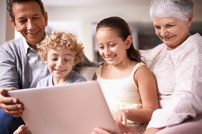 Buy stock photo Happy family, grandparents and children with laptop for communication, entertainment or research on sofa at home. Grandma, grandpa and kids smile on computer for online search or networking at house