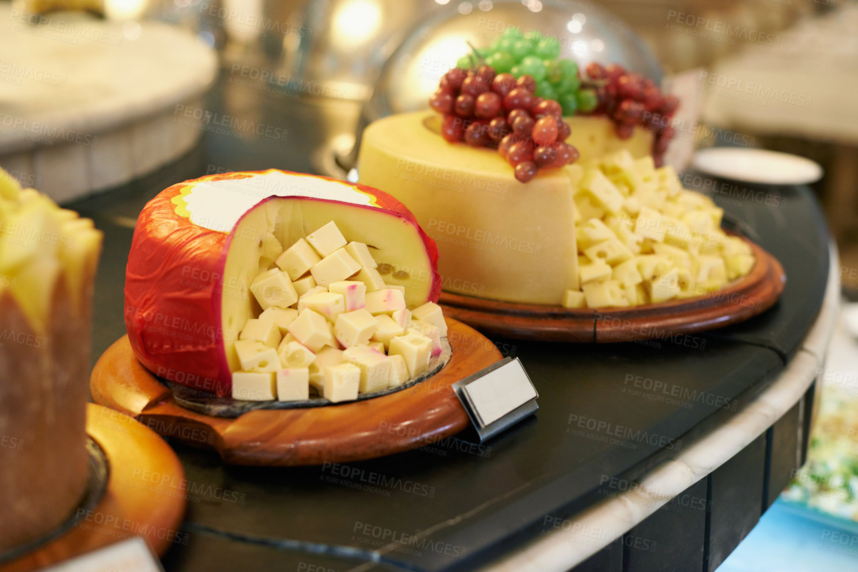 Buy stock photo Food, cheese and fruit in restaurant display for catering service, buffet selection and banquet for eating. Cafeteria, fine dining and closeup of table for lunch, supper and dinner event for wellness