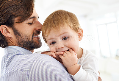 Buy stock photo Shot of a young father spending time with his baby boy