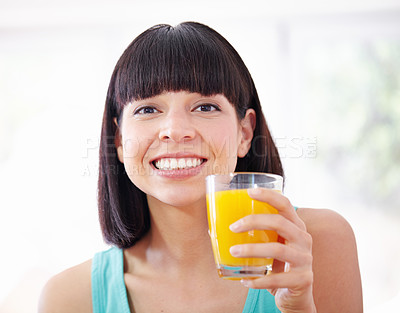Buy stock photo Portrait, orange juice and happy woman with drink for healthy diet, nutrition or wellness in home. Face, glass or person with beverage, vitamin c and organic fruit liquid for breakfast in the morning