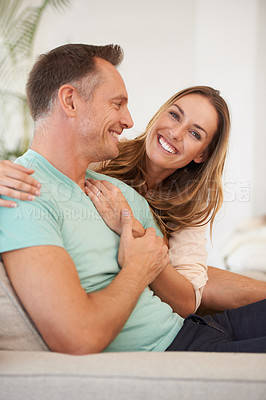 Buy stock photo Couple, hug with smile and love in marriage, life partner with support and affection for bonding at home. People with embrace, trust and care for commitment, loyalty and respect with happiness