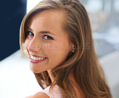 Buy stock photo A beautiful young woman spending the day getting her hair and makeup done