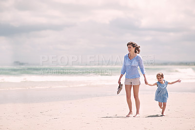 Buy stock photo Mother, child and hand holding on beach travel or explore environment or windy summer or holiday, weekend or bonding. Female person, daughter and relax at Australia seaside or peace, vacation or trip