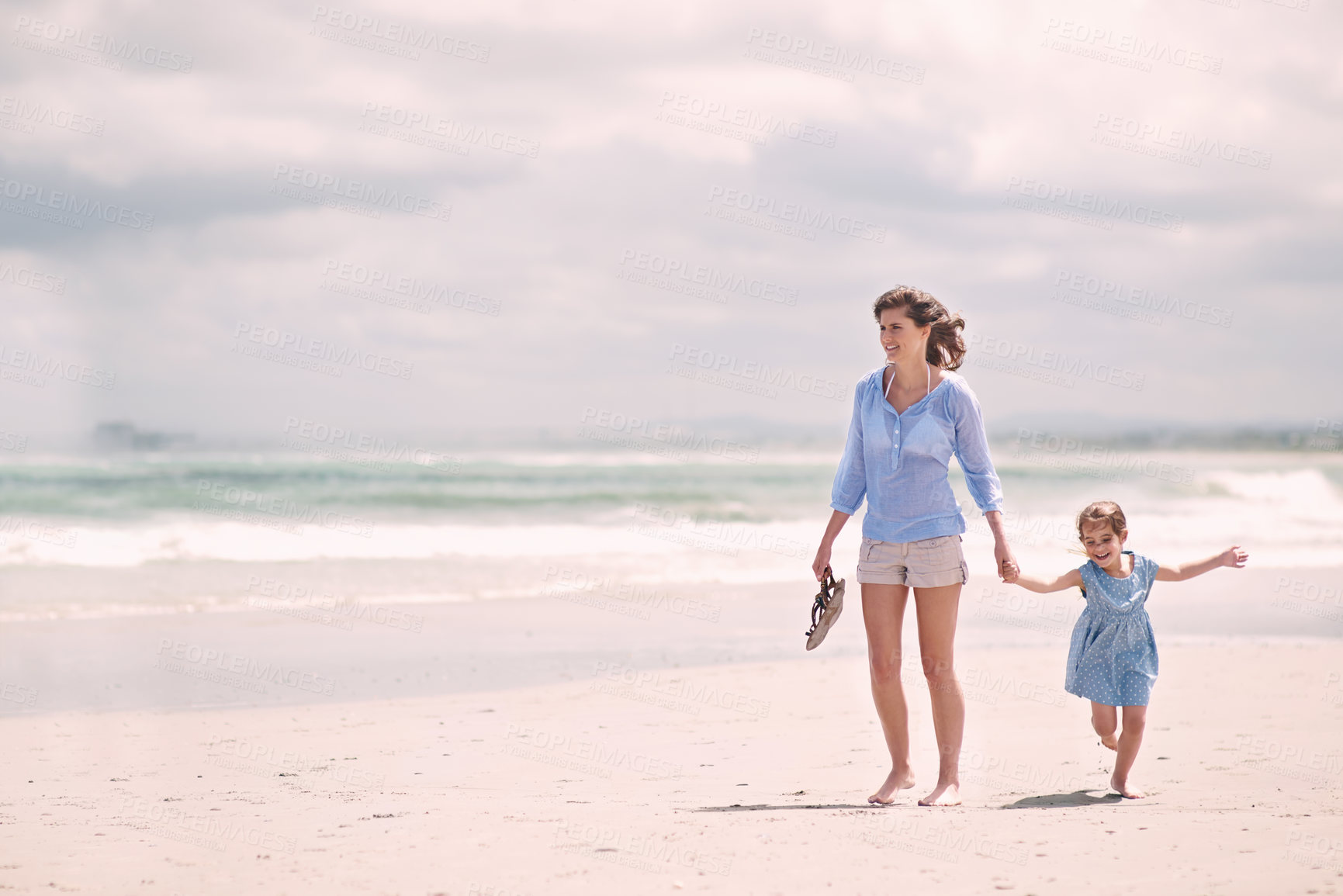Buy stock photo Mother, child and hand holding on beach travel or explore environment or windy summer or holiday, weekend or bonding. Female person, daughter and relax at Australia seaside or peace, vacation or trip