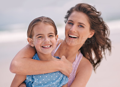 Buy stock photo Happy mother, portrait and child with hug at beach for love, support or care in outdoor bonding, holiday or weekend in nature. Face of mom and young daughter with smile for embrace on the ocean coast