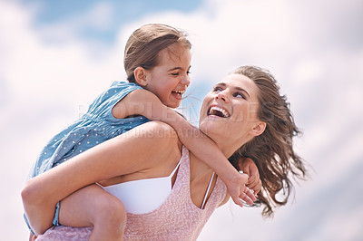 Buy stock photo Mother, daughter and piggyback or happy on the beach for bonding and love, travel and vacation in Mexico. Freedom, care and trust, woman and girl kid play game with joy and family together outdoor