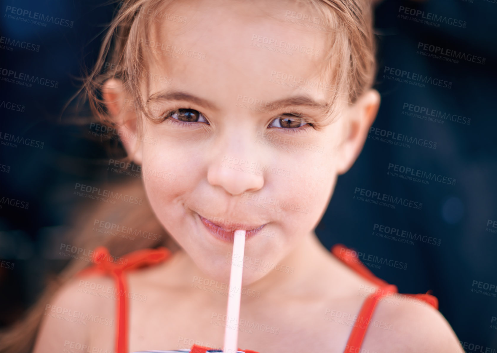 Buy stock photo Shot of a little girl drinking a beverage outdoors