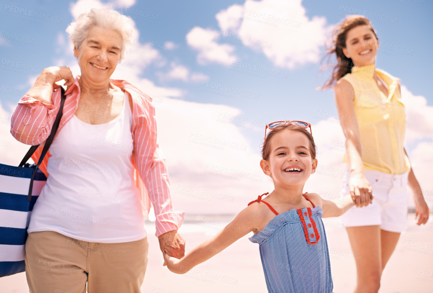 Buy stock photo Mother, child and grandmother or holding hands on beach as portrait for generation love, bonding or vacation. Female people, face and smile on seaside in Florida for holiday travel, family or outdoor