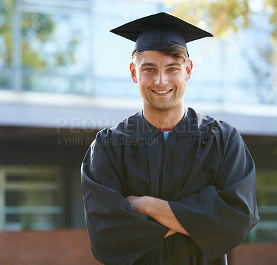Buy stock photo Graduation, student and portrait of man at university for learning, achievement and studying on campus. Education, academy and person with crossed arms for celebration, graduate ceremony and college