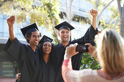 Buy stock photo Graduation, university and students smile for picture for learning, studying and knowledge on campus. Education, friends and man and woman with phone for celebration, graduate ceremony and college
