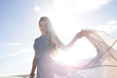 Buy stock photo Portrait, sunshine and woman with desert, fashion and weekend break with travel and getaway trip. Face, person or girl with holiday or summer with wind and vacation with lens flare or dress trail
