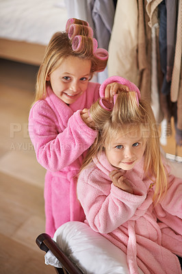 Buy stock photo Cropped shot of two young sisters playing with mom's makeup
