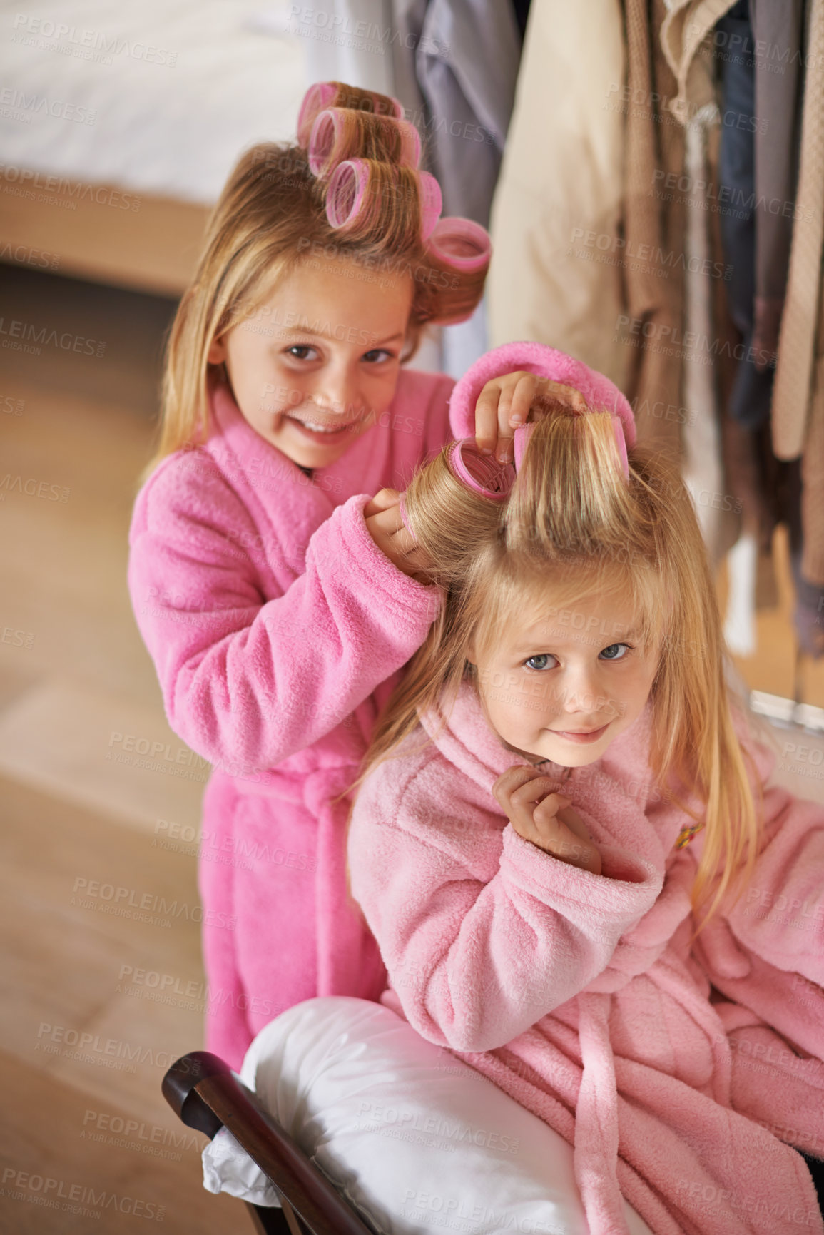 Buy stock photo Cropped shot of two young sisters playing with mom's makeup