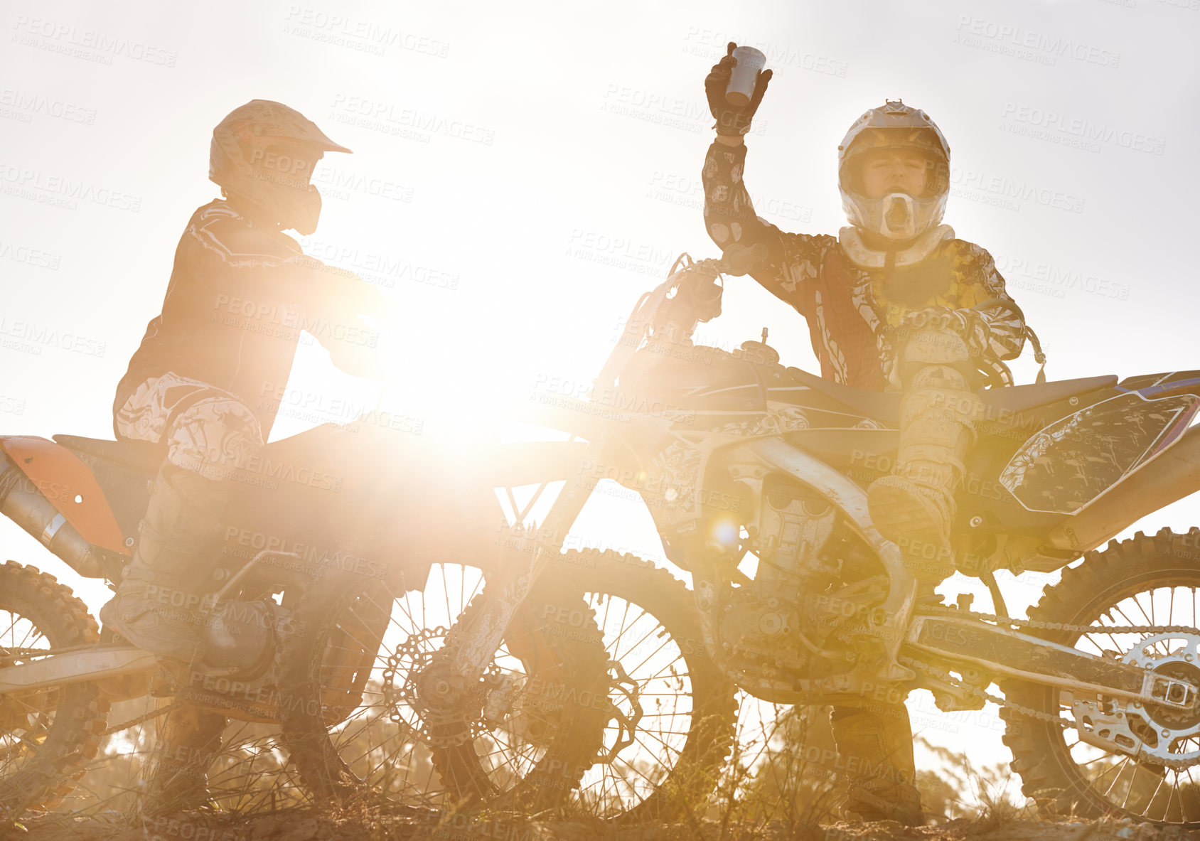 Buy stock photo Sport, racer or people on motorcycle outdoor on dirt road and relax after driving, challenge or competition. Lens flare, motorbike or dirtbike driver and sunrise on offroad course or path for racing
