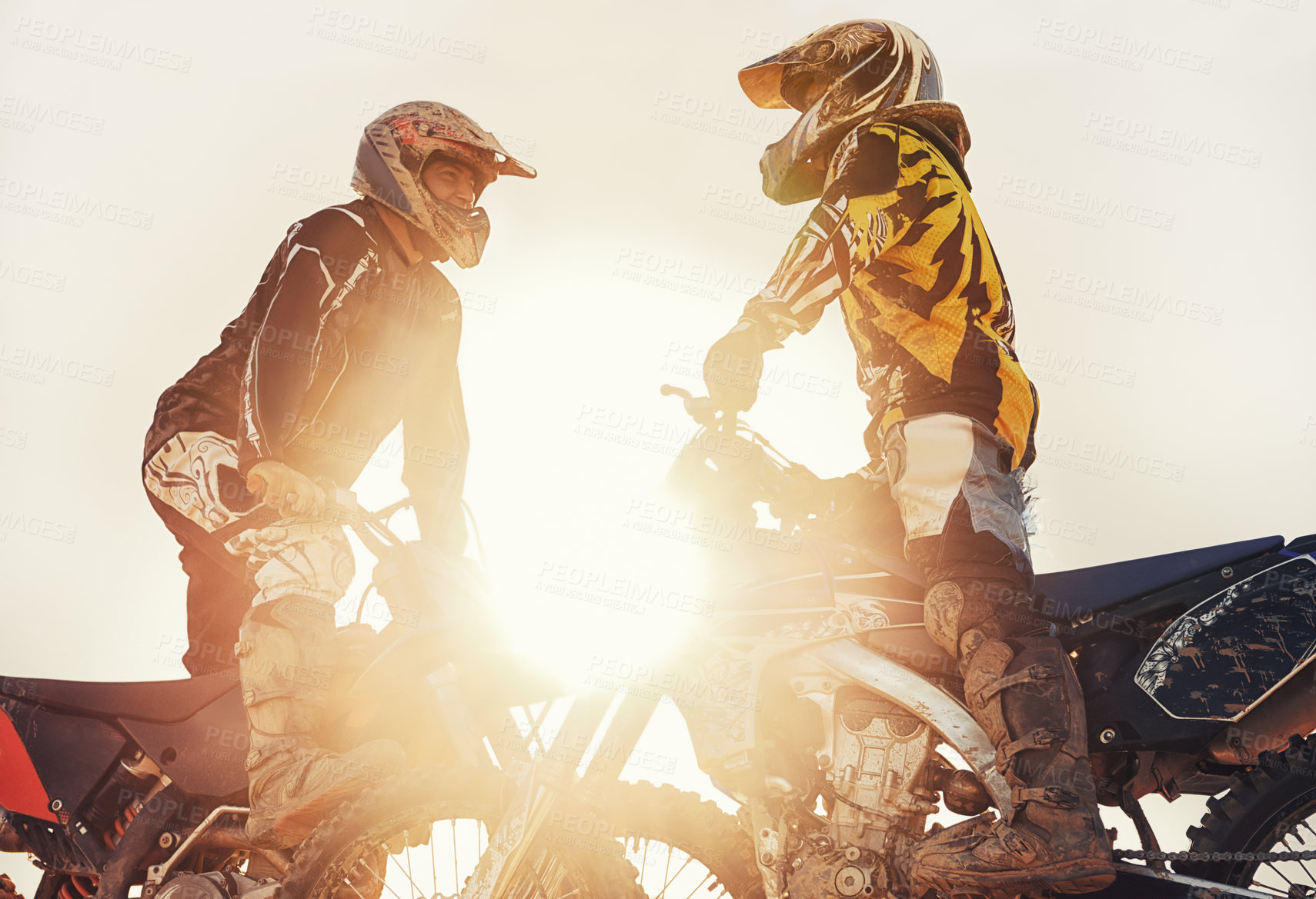 Buy stock photo Sport, racer or people on motorcycle outdoor on dirt road with relax after driving, challenge or competition. Motocross, lens flare or dirtbike driver or friends on offroad course or path for sunset