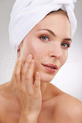 Buy stock photo Dermatology, skincare and portrait of woman with towel, glow and getting ready in studio. Beauty, healthy skin and face of girl on white background with luxury facial, morning routine and cosmetics.