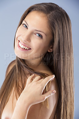 Buy stock photo A woman with long hair posing in a studio