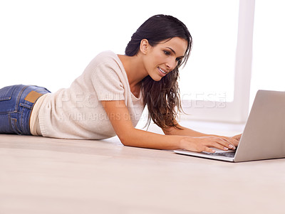 Buy stock photo Relax, smile and laptop with woman on floor of living room in home for email, internet or research. Computer, social media and typing with happy young person in apartment for website browsing