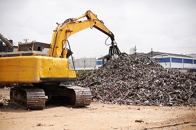 Buy stock photo Crane, machine and scrapyard to recycle metal for sustainability, manufacturing or stop pollution. Vehicle, tractor and outdoor in junkyard, plant or ecology for iron, steel industry and environment