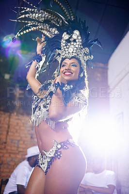 Buy stock photo Carnival, dance and woman in costume at night for festival, celebration and holiday party. Street, samba dancer and person in masquerade outfit for performance, culture and event in Rio de Janeiro