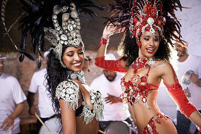 Buy stock photo Cropped shot of two female performers and their band