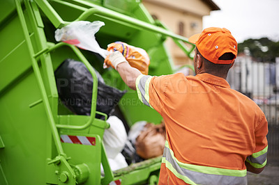 Buy stock photo Cropped shot of a garbage collection worker