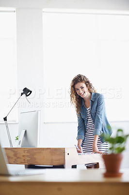 Buy stock photo Woman, portrait and writing or planning at office desk for creative, project and startup in architecture or design. Young designer or worker with creative notes for business, floor plan and computer