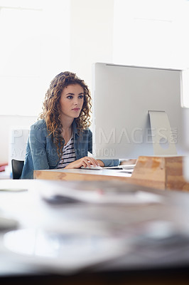 Buy stock photo Journalist, office or woman with computer to research news, online business or digital project. Focus, database or serious girl employee writing blog reports or internet article on pc or laptop desk