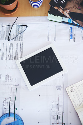 Buy stock photo Tablet, blueprint and mockup on office desk above for architecture planning, strategy or layout. Top view of building paperwork, floor plan or architect notes in construction with tech screen display