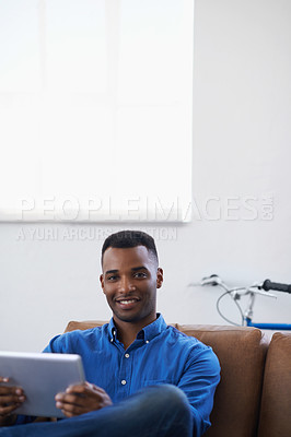Buy stock photo Man, tablet and relax in portrait at home, subscribe and internet for web or blog. Black male person, smile and streaming entertainment on couch, mockup space and app for online shopping on weekend