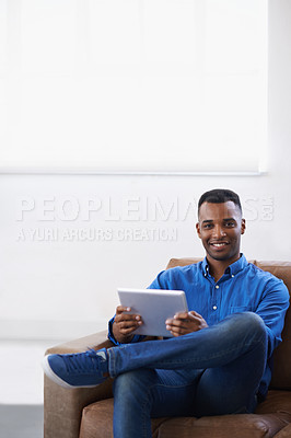 Buy stock photo Man, tablet and online in portrait at home, subscribe and internet for website or blog. Black male person, smile and streaming entertainment on couch, mockup space and app for shopping on weekend
