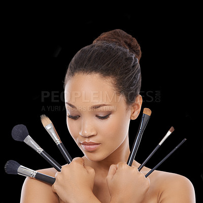 Buy stock photo Woman, skincare and makeup brushes for cosmetics in studio, choice and decision for beauty. Female model person, tools and equipment for application, beauty and facial treatment by black background