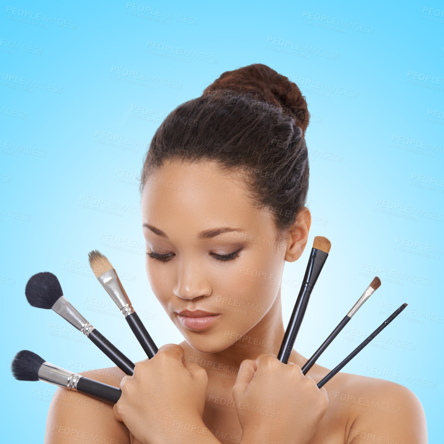 Buy stock photo Woman, grooming and makeup brushes for cosmetics in studio, choice and decision for beauty. Female model person, tools and equipment for application, skincare and facial treatment by blue background