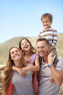 Buy stock photo Parents, children and outdoor portrait as family or holiday connection in nature or explore park, relax or vacation. Mother, father and siblings on shoulders in Florida or travel, adventure or fun