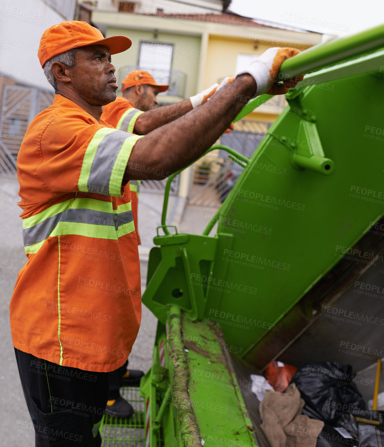 Buy stock photo Garbage, worker and man in city with trash, maintenance and waste management service. Urban, cleaning and person with sanitation, industrial truck and collection of rubbish for infrastructure