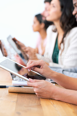 Buy stock photo Hands, tablet and team of business people closeup in meeting for conference, networking or communication online. Desk, scroll and technology for planning, research and designer at creative startup
